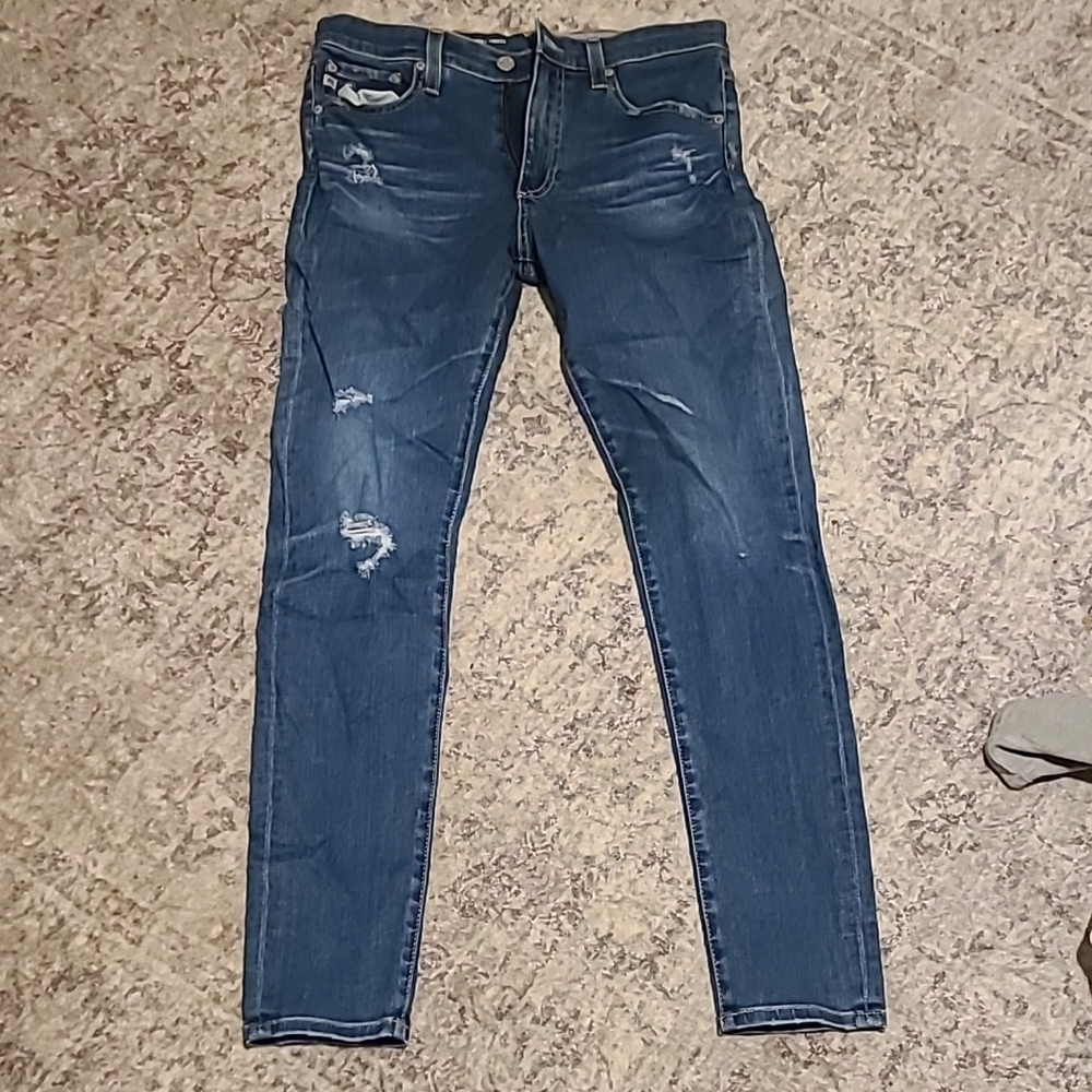 Distressed Blue Denim Jeans